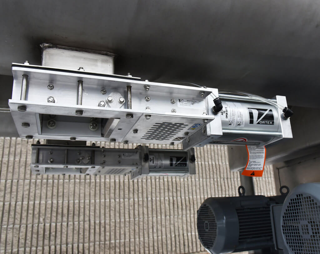 Used DOUBLE RIBBON BLENDER, 60 cubic foot, food grade, stainless steel, twin-shaft, with 6 inch slide-gate discharges for mixing granular, particulate food products, Alard item Y0850.